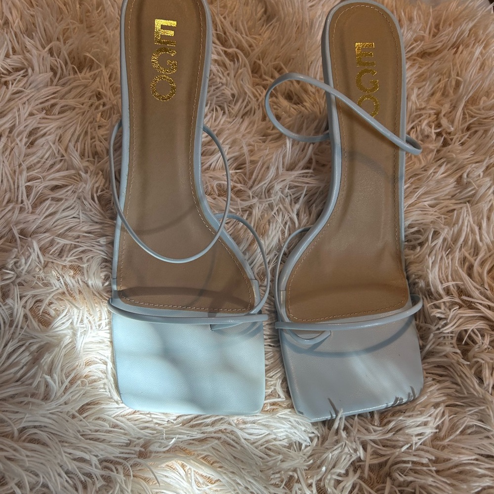 Ego Baby Blue toe strap mules